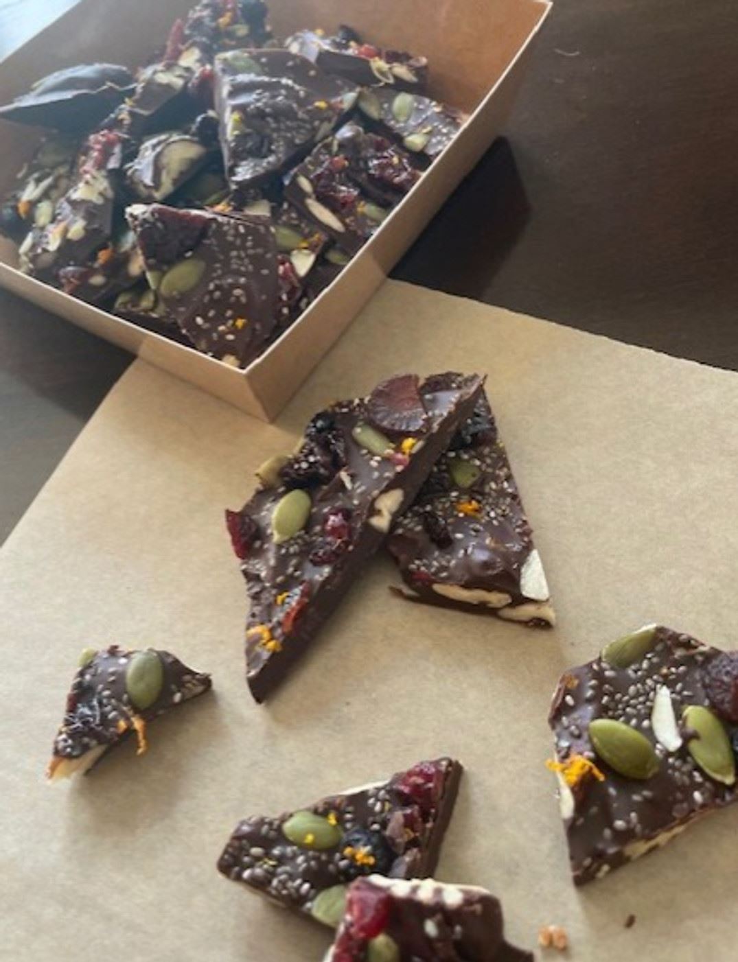 Super food chocolate bark with dried berries and seeds
