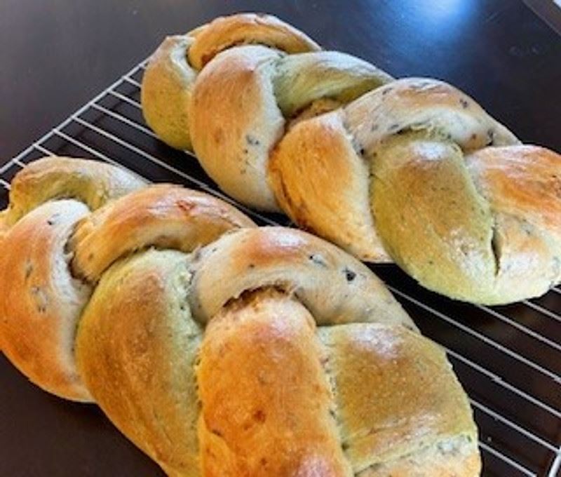 Braided trio loaf with basil pesto, sundried tomato and black olive
